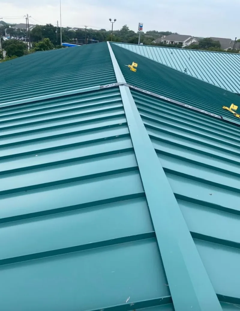 Green commercial metal roof ridge and valley for Metal Roof Repair in Corona de Tucson